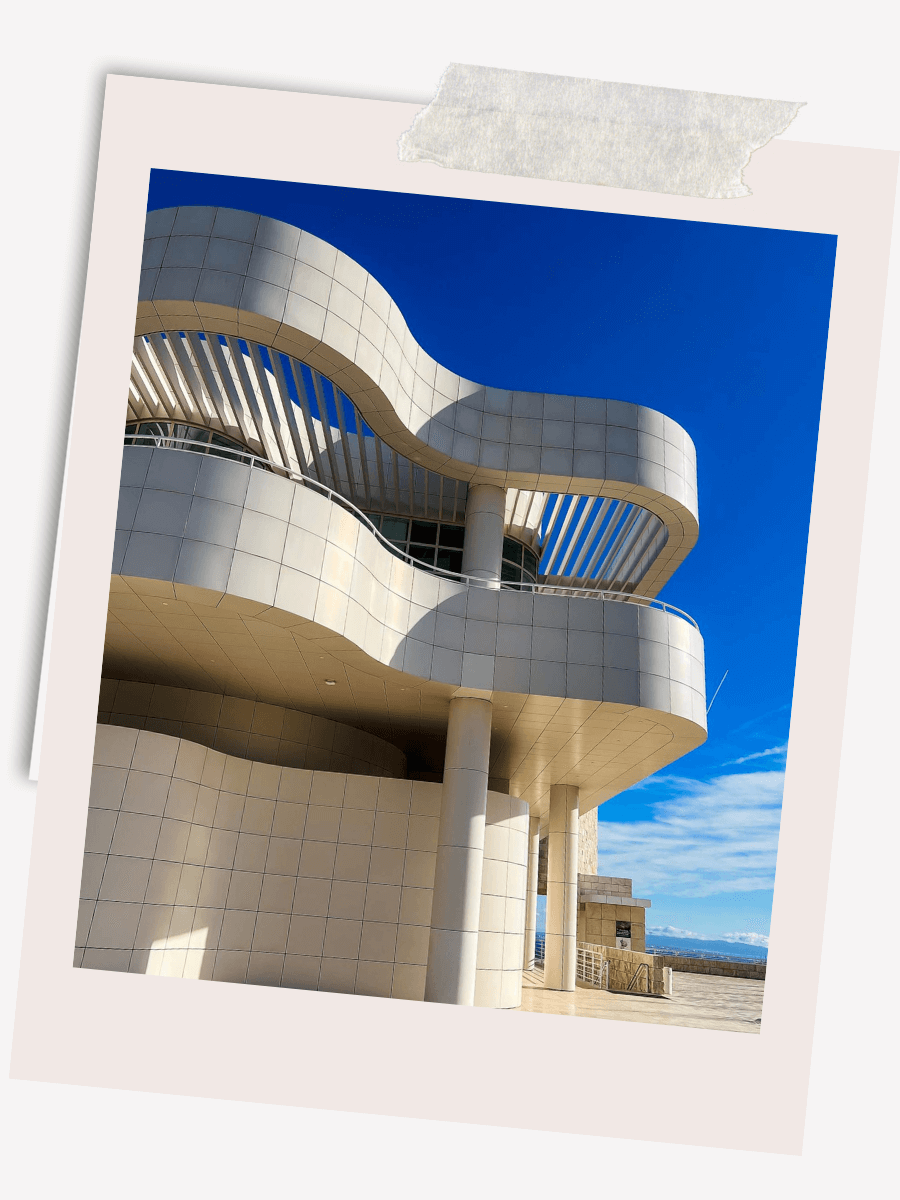 The Getty Center’s iconic white stone buildings, designed by Richard Meier, shine against the backdrop of rolling hills and blue skies. Visit the Getty Center.